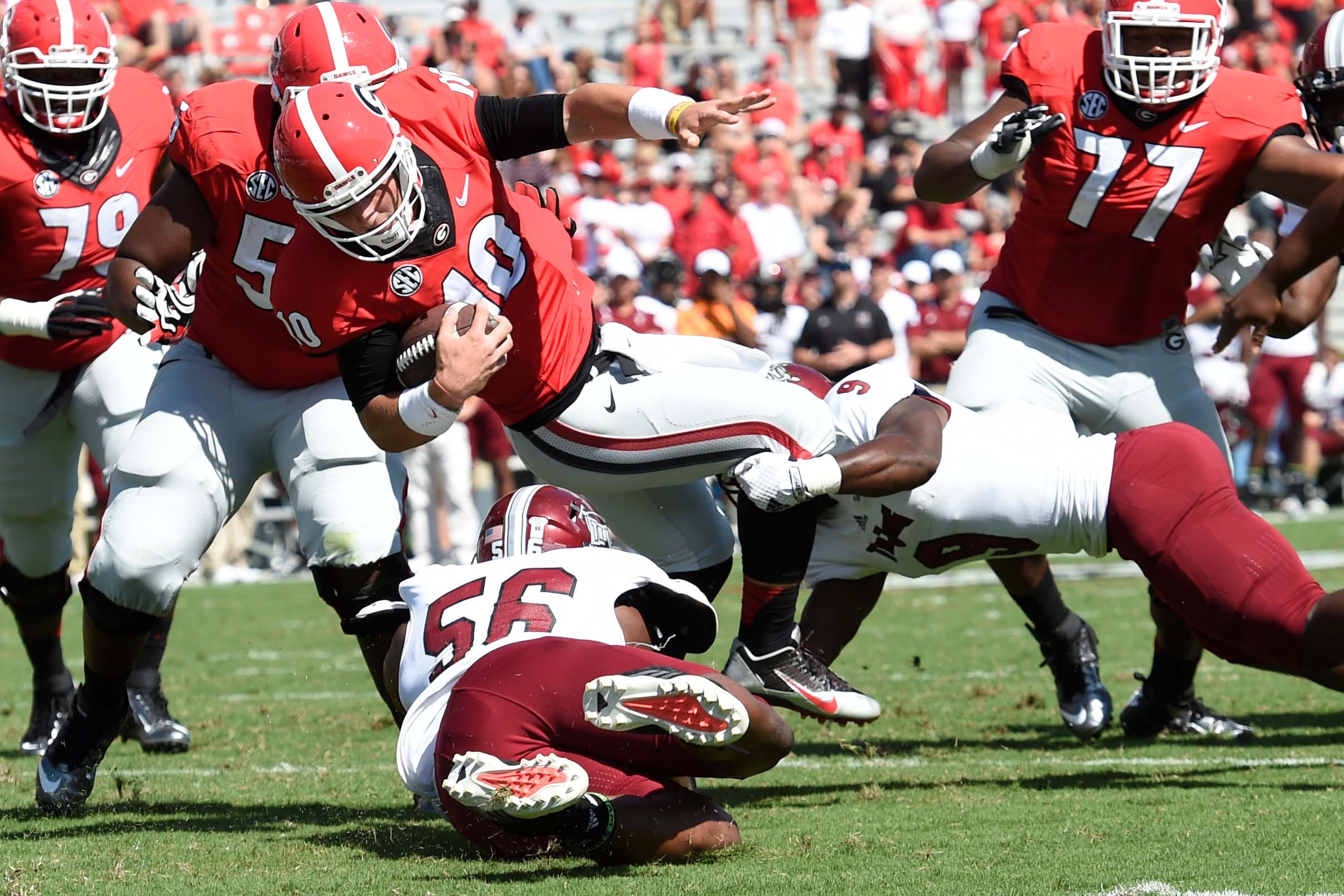 Michel's 3 TDs lead No. 13 Georgia past Troy, 66-0 | 13wmaz.com